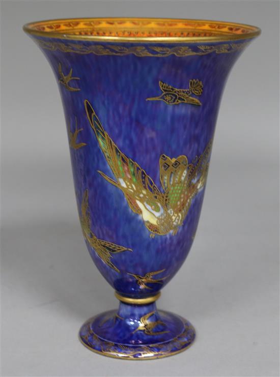 Daisy Makeig-Jones for Wedgwood, a lustre Humming Bird trumpet shaped vase, gilt on blue ground